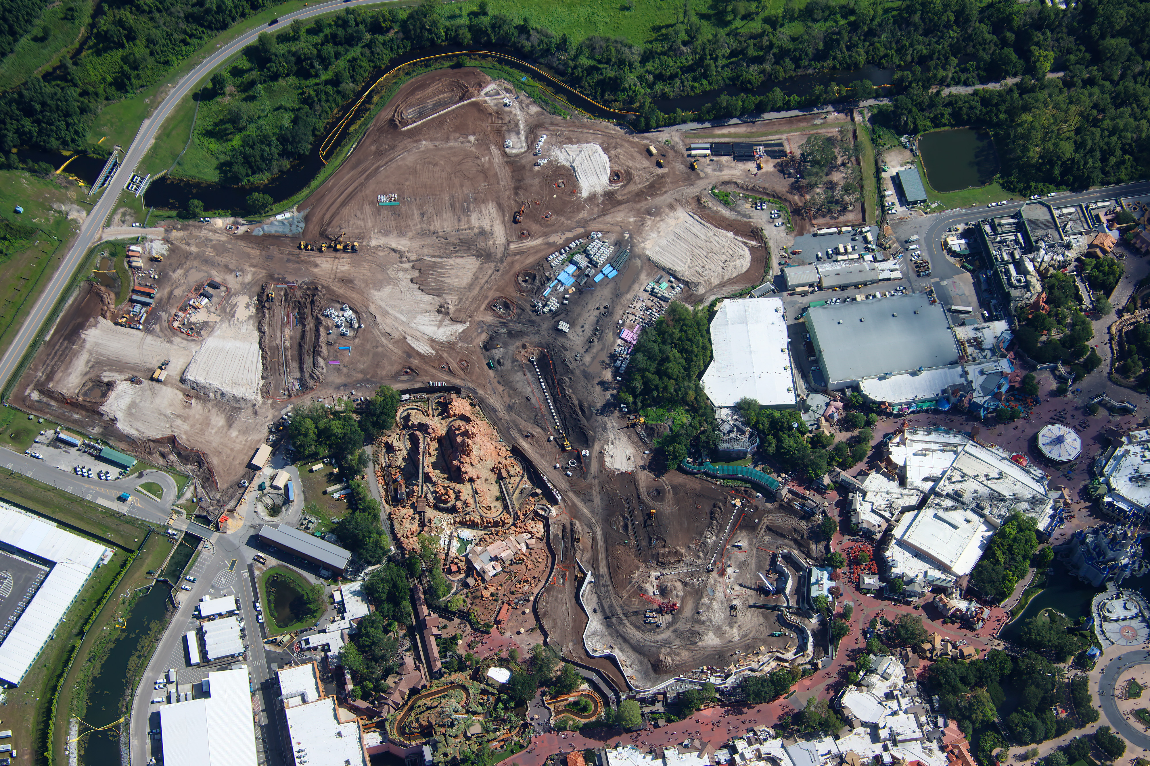 Magic Kingdom's Piston Peak National Park Takes Shape: Retaining Wall Nearly Complete, Utility Work Underway